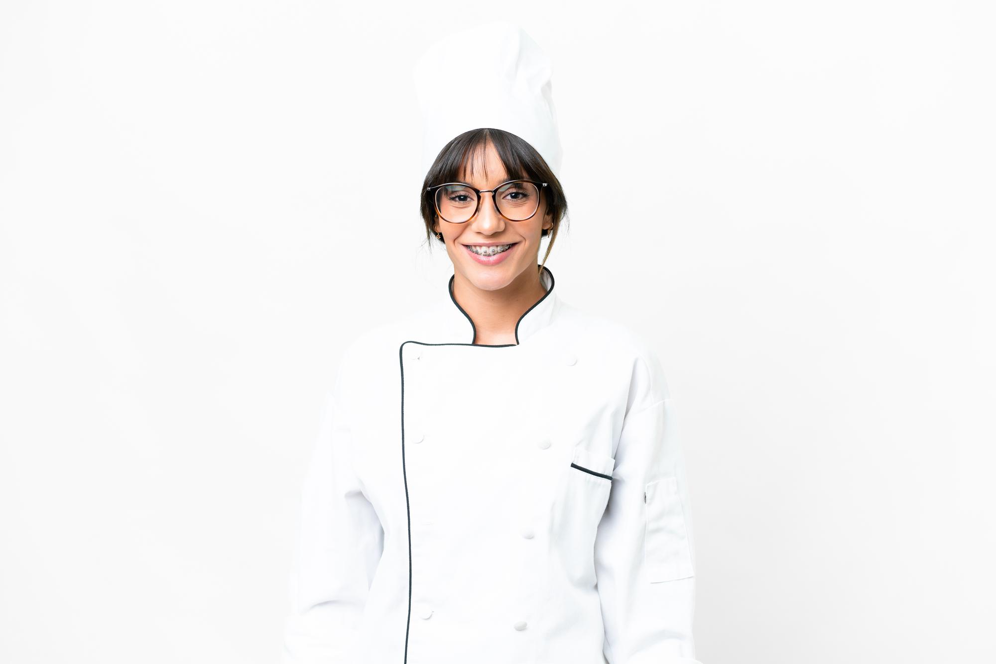Chef smiling in workshop kitchen